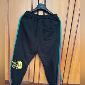 North face Gucci sweatpants… size says small but fits like medium/L